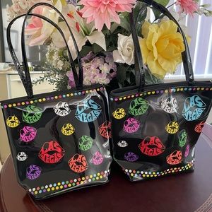 2 New Las Vegas Souvenir purses 
-glossy black & bright colors Las Vegas print